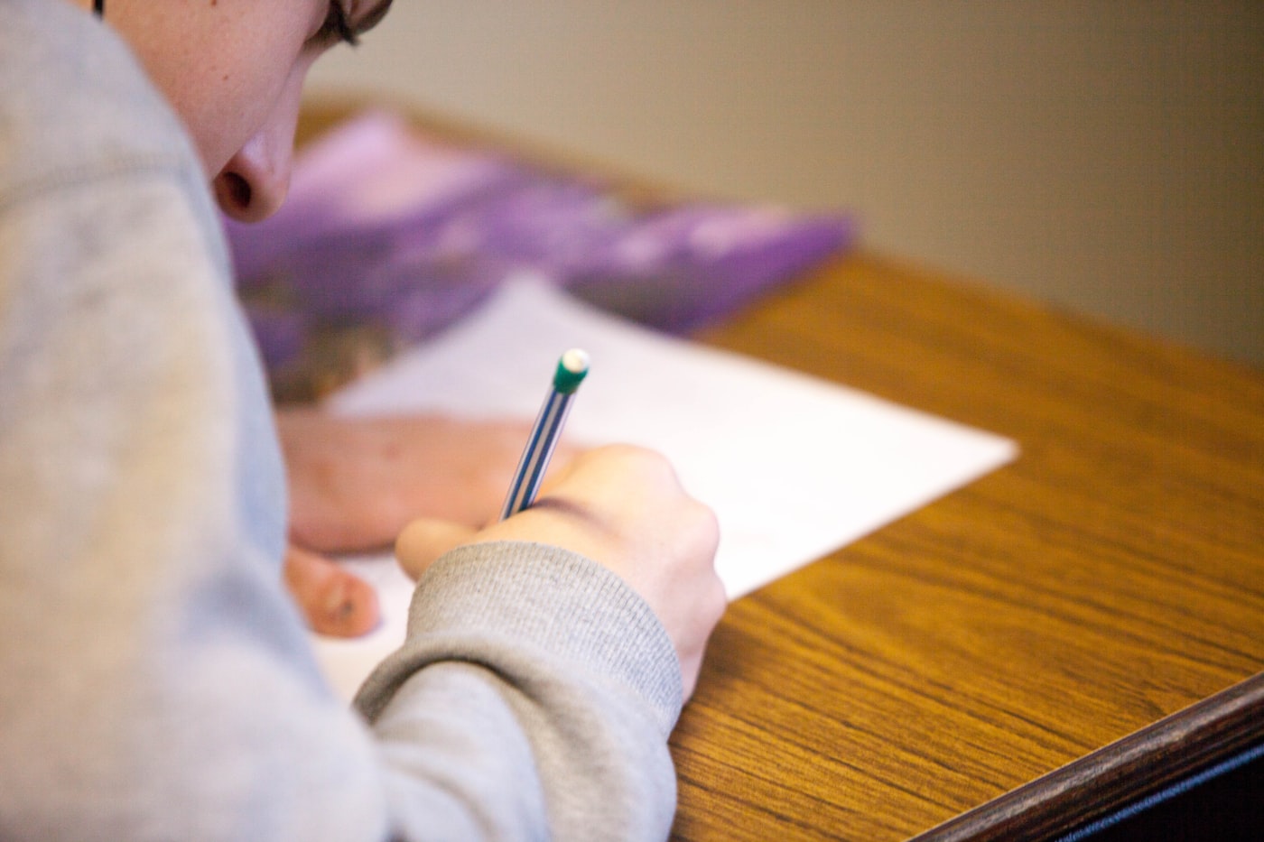 A student writing an examination
